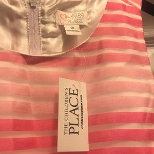 A pink and white dress.